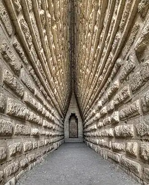 Image 4Royal KurganPhotograph: Anatoly ShcherbakThe Royal Kurgan is a 4th century BC kurgan (burial barrow) located near present-day Kerch, Crimea. The mound is almost 20 metres high and its base perimeter is about 250 metres. It holds a burial chamber with a square floor plan which gradually merges into the circular shape of a corbelled dome ("false vault"). It is assumed that the Royal Kurgan was the final resting place of a ruler of the Bosporan Kingdom.More selected pictures