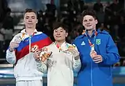 All-around victory ceremony (from left to right): Sergei Naidin (Silver), Takeru Kitazono (Gold), Diogo Soares (Bronze)