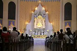 A complete view of the main altar where the baldacchino and the La Naval currently sits in