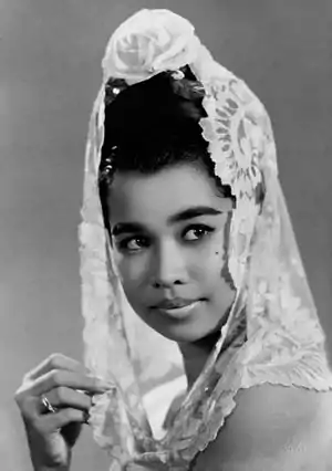 Image 11Baby HuwaePhotograph credit: Tati Photo Studio; restored by Chris WoodrichBaby Huwae (22 November 1939 – 5 June 1989) was an Indonesian model, film actress and singer. Born in Rotterdam, Netherlands, she moved to Indonesia, where she took up modelling, by the 1950s. She entered the film industry in 1958, and gained popularity following the success of Asrama Dara. Over the next few years, Huwae acted in a further five films and established a girl group, the Baby Dolls, with several actresses who had appeared in her second film. She made a guest appearance in one more film in 1971 after a ten-year hiatus.More selected pictures