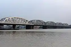 A multi-span simple truss bridge, Vivekananda Setu over the Hooghly River in Kolkata, India.