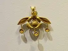 The Bee Pendant, an iconic Minoan jewel; 1700–1600 BC; gold; width: 4.6 cm; from Chrysolakkos (gold pit) complex at Malia; Archaeological Museum of Heraklion (Heraklion, Greece)