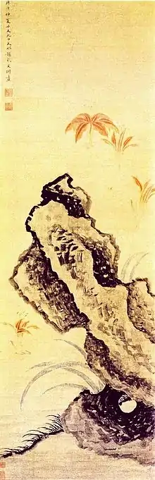 Painting on yellow paper, with green and yellow flowers in the background and large dark rocks in the foreground