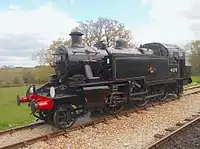 British Railways 2-6-2T Class Ivatt Two No. 41298 runs round the train at Wootton
