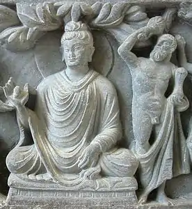 The Buddha and Vajrapani under the guise of Herakles, c. 2nd–3rd century CE