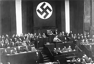 Distant photo of Hitler addressing the Reichstag