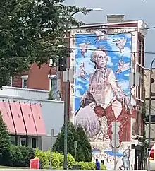 This photo is taken of a mural near downtown Cincinnati where the meat packing businesses were located. It shows a cow named Cincinnati Freedom who escaped from the slaughtehouse, and later lived out her life in a farm sanctuary in the state of New York.