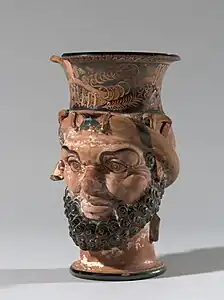 Etruscan vessel with a single handle, in the shape of a satyr's head, c.340 BC, ceramic, Petit Palais, Paris