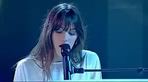 Cardin performing in 2016