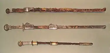Two Chinese swords (top) of the Sui dynasty. Bottom: Japanese sword with scabbard, Kofun period, 6th century, Met Museum.