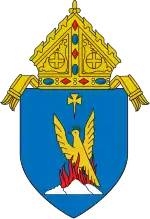 The arms of the Diocese of Phoenix: The arms feature a phoenix, the namesake of the diocesan seat, Phoenix, Arizona.