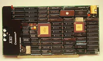 1980s Cromemco XXU, a Motorola 68020 processor S-100 bus card. The axial parts between the ICs are decoupling capacitors.