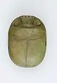 Heart scarab of the singer of Amun Iakai; 1550–1186 BC; glass; length: 4.8 cm, width: 3.5 cm, height: 1.5 cm; Metropolitan Museum of Art (New York City)