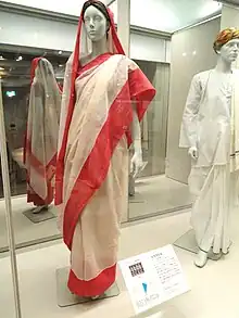 Image 24Red and cream Indian woman's saree, late 1990s (from 1990s in fashion)