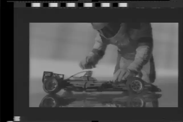 Image Lego Technic Advert PAL visually showing black and white macrovision blocks in the top and left hand corrner of the full composite signal frame.