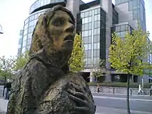 Image 9A memorial to the Great Famine (Ireland), a famine event in Ireland that faced elongated suffering from the UK's domestic policy failures at the time under the Prime Ministers Sir Robert Peel and Lord John Russell. (from Health politics)