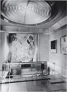 Jacques Doucet's hôtel particulier, 1927. Picasso's Les Demoiselles d'Avignon can be seen hanging in the background.