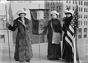 Rosalie Jones, with fellow suffragettes Jessie Stubbs and Ida Craft, handing out WSP meeting fliers, circa 1912-1913