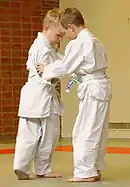 Image 50Two children training in judo techniques (from Judo)