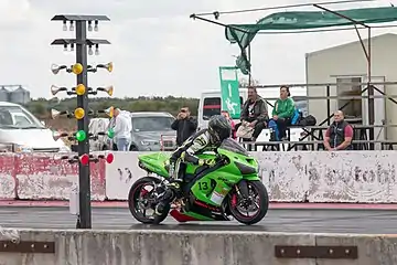 A Kawasaki Ninja ZX-6R at the start