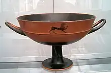 Lip cup by the potter Tleson with signature ("Tleson, son of nearchos, made me"), c. 540 BC, now in the Munich State Collection of Antiquities