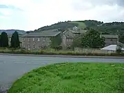 Buildings originally built as Llanfyllin workhouse, a state-funded home for the destitute which operated from 1838 to 1930.