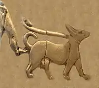 Naked man with penile sheath (fragment) walking a dog on a leash (Back, 5th register). Naked and shaven-headed men are a regular fixture of the Art of Uruk and Sumerian religion.