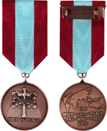 Men's version of the Memorial Medal (obverse and reverse).
