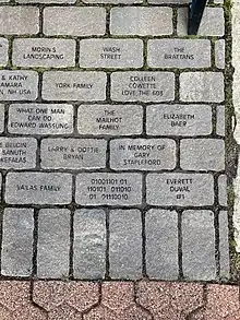 Memorial stones at Ralph Baer memorial including the stone with the binary inscription