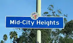 Mid-City Heights neighborhood sign on West Boulevard as it crosses over the Santa Monica Freeway.
