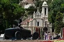 Statue and Catholic Church