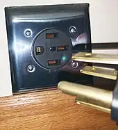 A NEMA 14-50 supplying 12 kW (9.6 kW sustained) on a 240 V circuit to recharge an EV