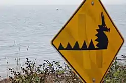 A sea serpent road sign