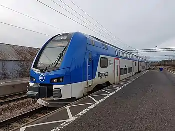 Communter train of type Stadler KISS at the Örbyhus station.