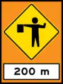 Flagman sign with 200m