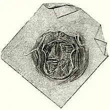 A seal representing a coat of arms divided into four parts, two of them depicting a wing, and the other two depicting a lion.