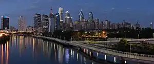 Center City Philadelphia (in background) and the Schuylkill River (on left) as seen from South Street Bridge, July 2016