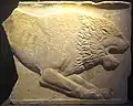 Relief with an attacking lion