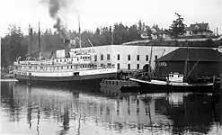 Friday Harbor Packing Co. salmon cannery Friday Harbor and Puget Sound Navigation Co.'s steamer Whatcom at dock, 1915