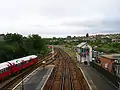 Looking south from the station's old footbridge; the Island Line's signalbox is visible on the right