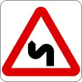 Double bend first to left (Right if the symbol is reversed)