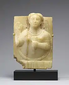 Sculpture of a Sabaean priestess raising her hand to intercede with the sun goddess on behalf of a donor. Probably first century.