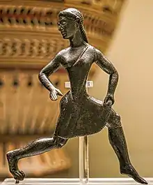 Bronze figure of a running woman from Sparta. The baring of one breast was a sign that a woman was engaging in athletics or warfare. British Museum, 520-500 B.C.