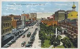 A view north along Franklin Street in 1922. The old Hillsborough County Courthouse is pictured on the right.  A Confederate Monument is located in front of the courthouse, on the lower right.