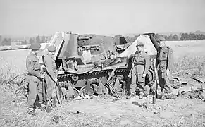 Men of the 6th Airborne Division investigate a Marder I (H39 chassis) they had destroyed