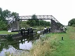 Ribbontail bridge and lock across the Royal Canal near Longwood