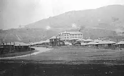 The company town with its hotel, restaurant, bar, houses, and cement processing plant c. the 1920s