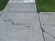 concrete stamped with date and company name