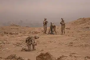 Marine M252 mortar crew deploying on a cliff-side in the Middle Euphrates River Valley in Syria, 11 October 2018
