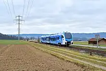 Unit 3501 of Stadler Rail AG, ordered by Metrolink for the Arrow service in San Bernadino, on a test run on the Etzwilen - Singen heritage railway in Ramsen, Switzerland. These tests ran from December 2022 to June 2023.